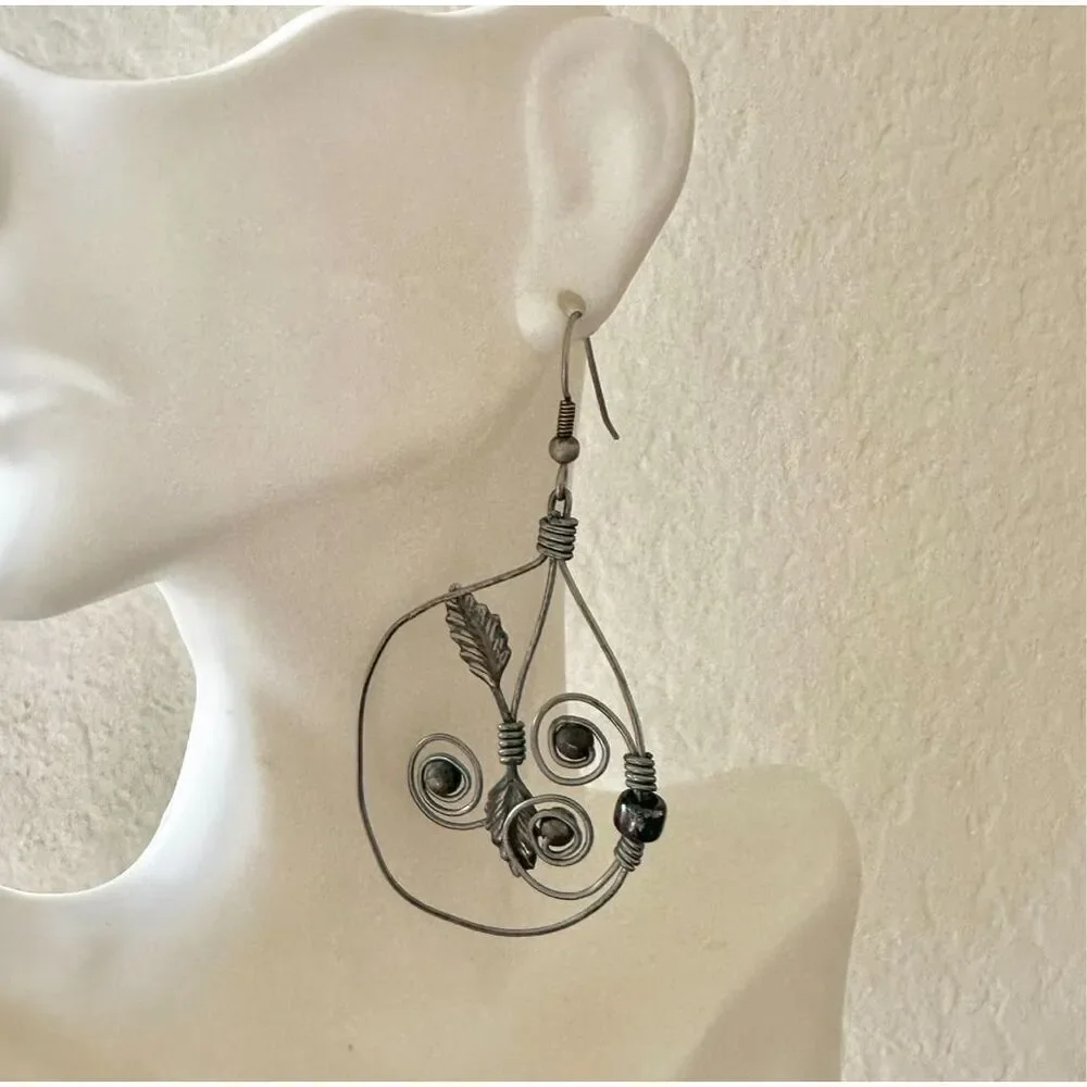 Silver tone teardrop leaf wire artisan earrings